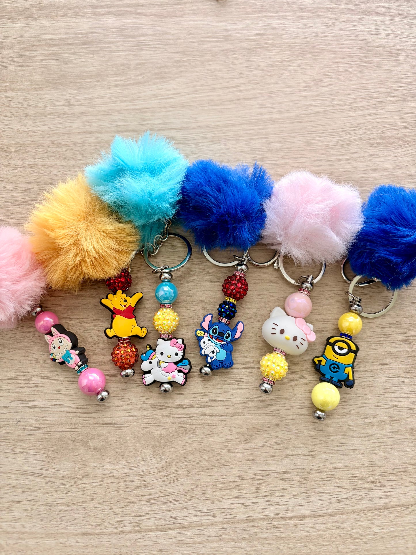 Pom character beaded keychain