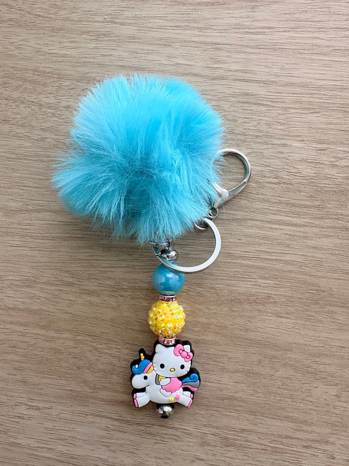 Pom character beaded keychain