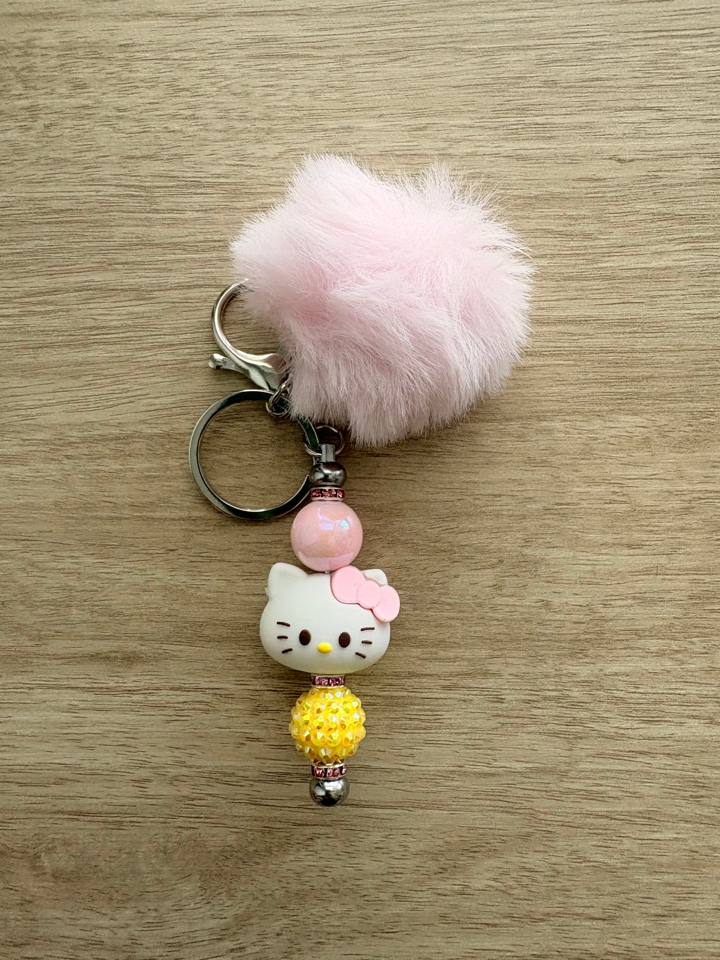 Pom character beaded keychain
