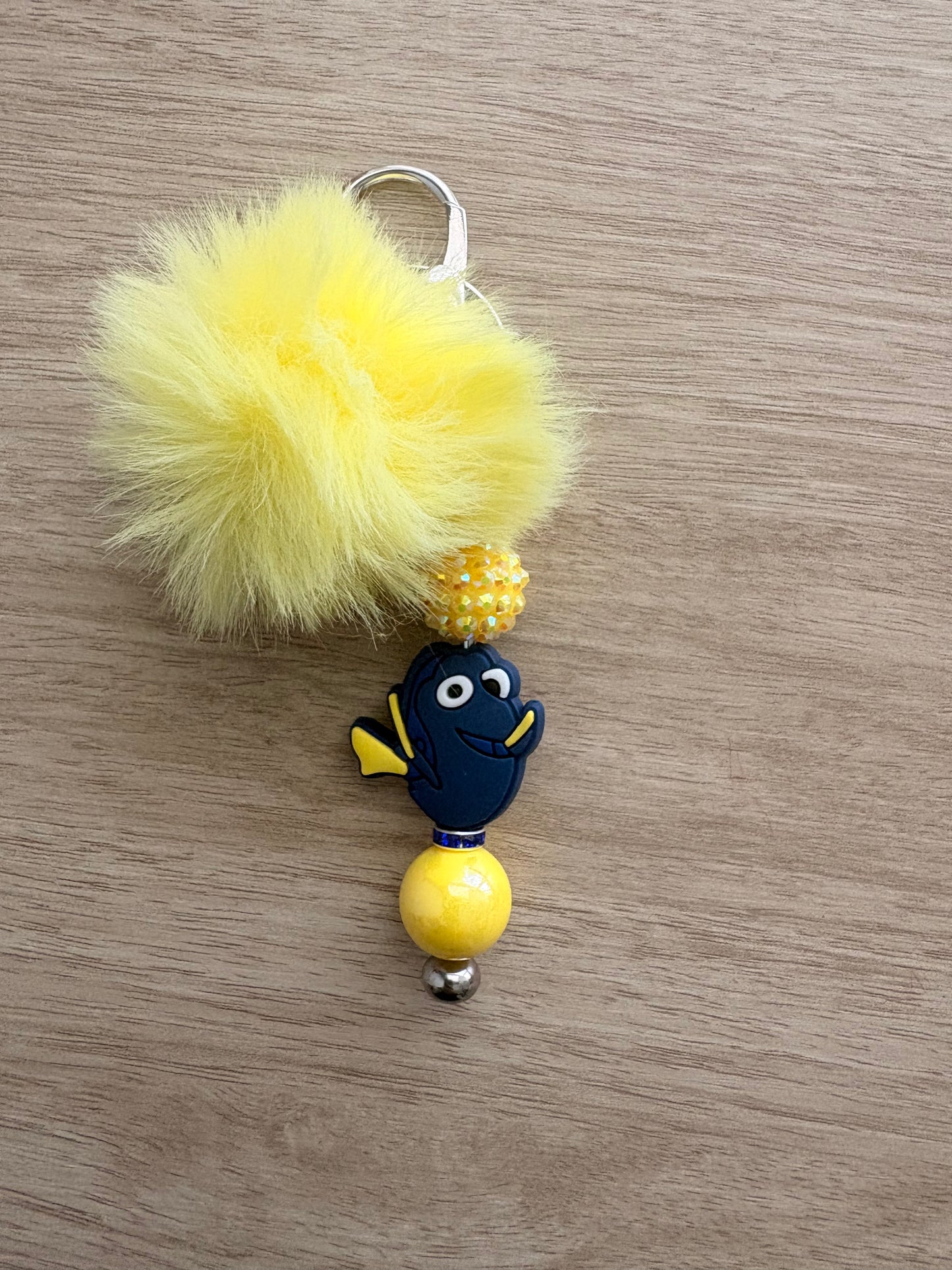 Pom character beaded keychain